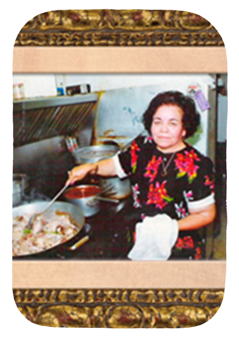 Photo of Maria Cardenas cooking in the kitchen of her restaurant.