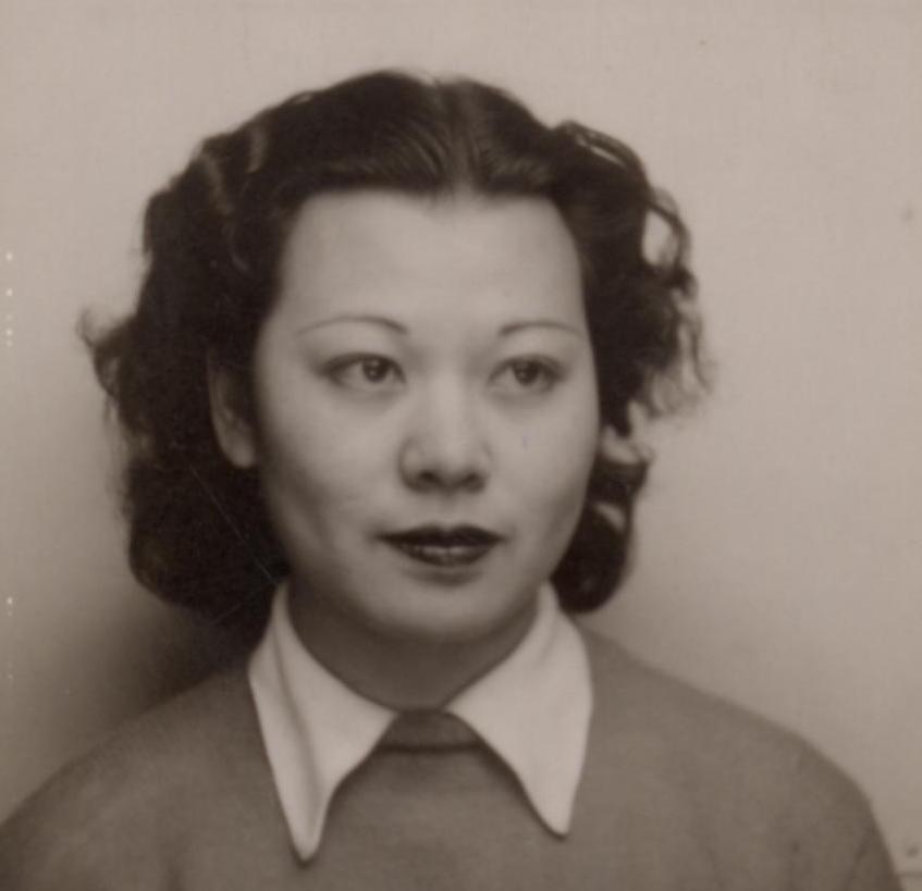 Japanese American woman wearing a sweater