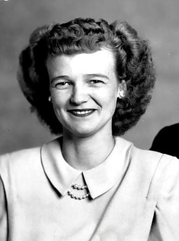 Photo of woman with earrings and necklace